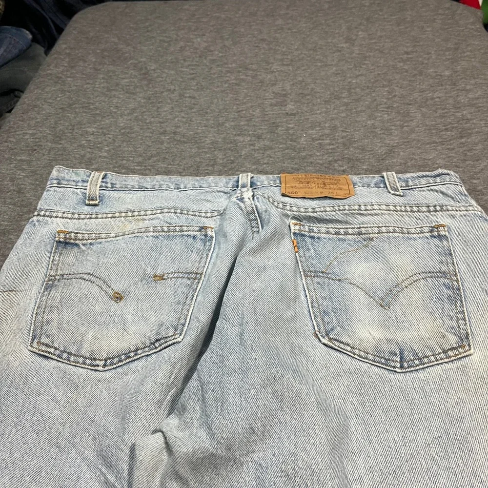 Vintage Levis 550 Made in USA Orange Tab Jeans 38x36 Light Wash 90s Tapered Leg